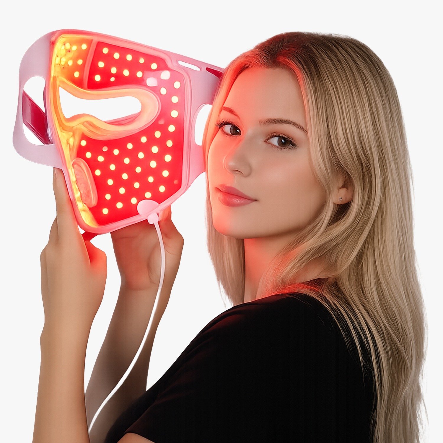 Young woman holds a red LED face mask near her cheek smiling slightly The mask glows red with numerous lights for facial therapy  Does LED Light Therapy Actually Work What UK Salons and Clinics Need to Know in 2026   trendloxcom